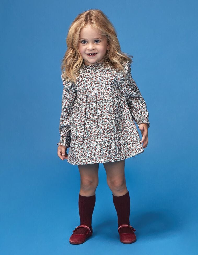 Robe imprimée à fleurs avec volants bleu clair