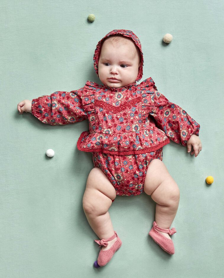 Completo a fiori corallo