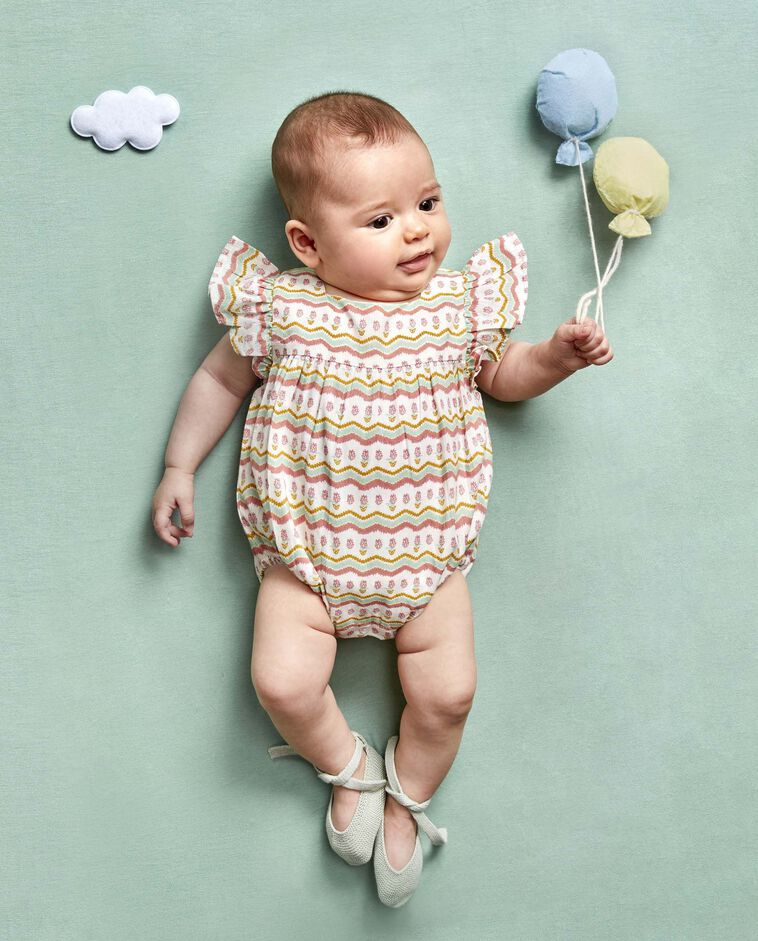 Babygrow branca estampada