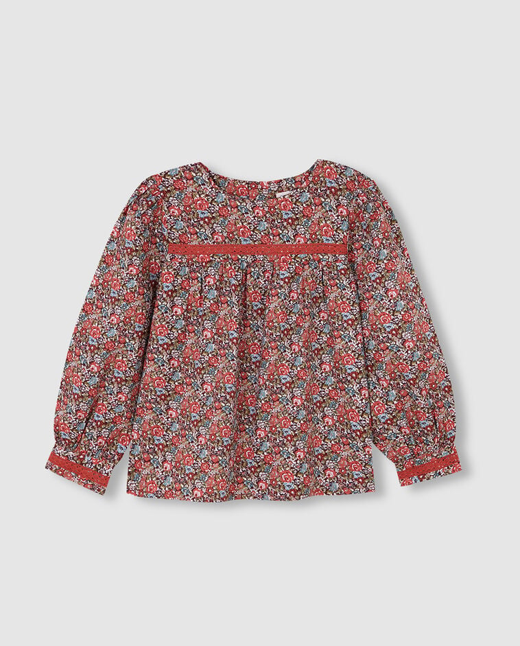 Blusa laranja com estampado de flores e tira bordada menina