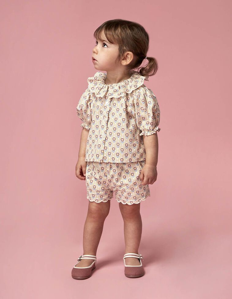 Blusa con stampa bianca
