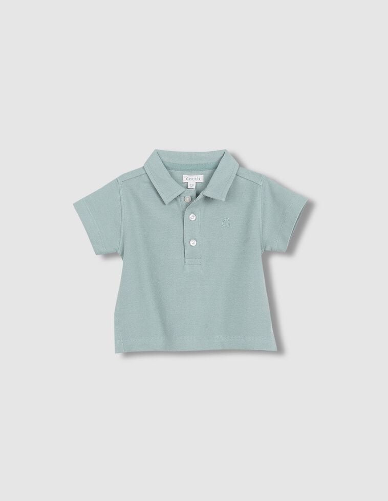 Polo vert détails contrastés