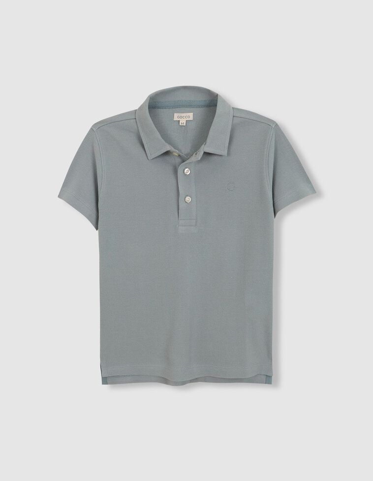 Polo vert détails contrastés