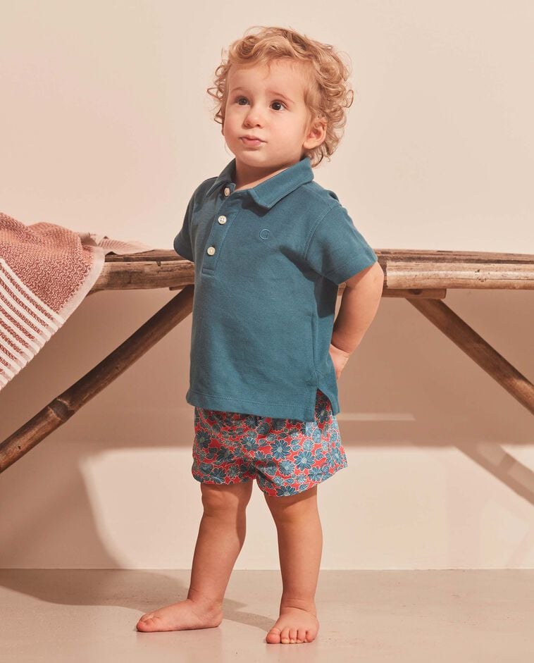 Costume con fiore grande rosa