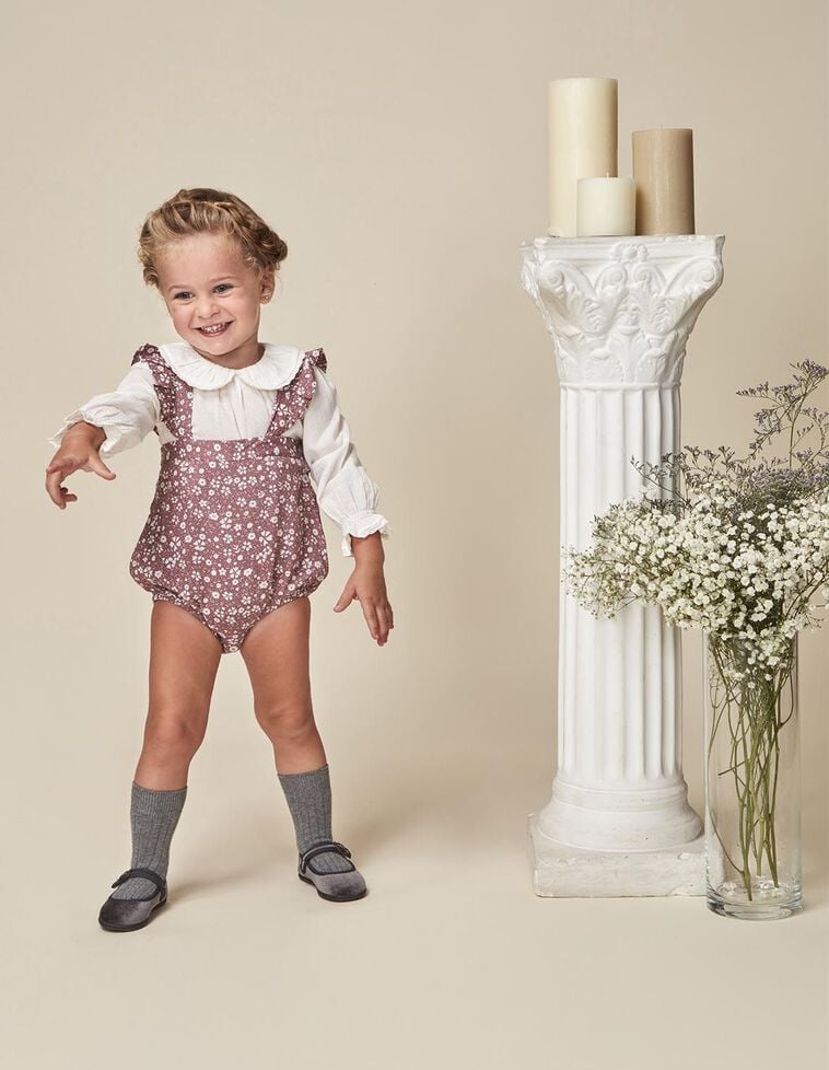 Barboteuse imprimée à bretelles violettes