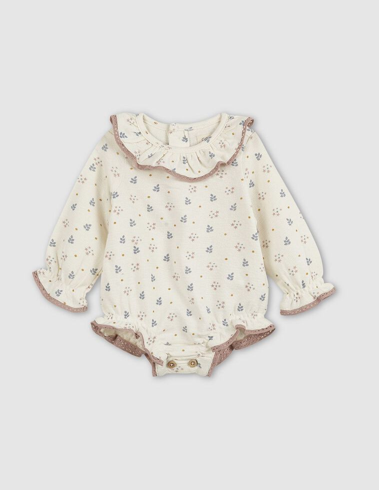 Jardineira estampada c/ folhos na gola