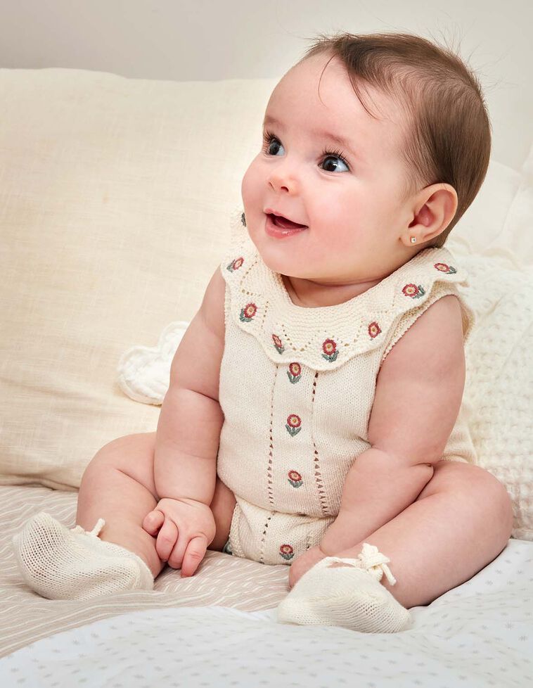 Babygrow sem pernas com bordados cru