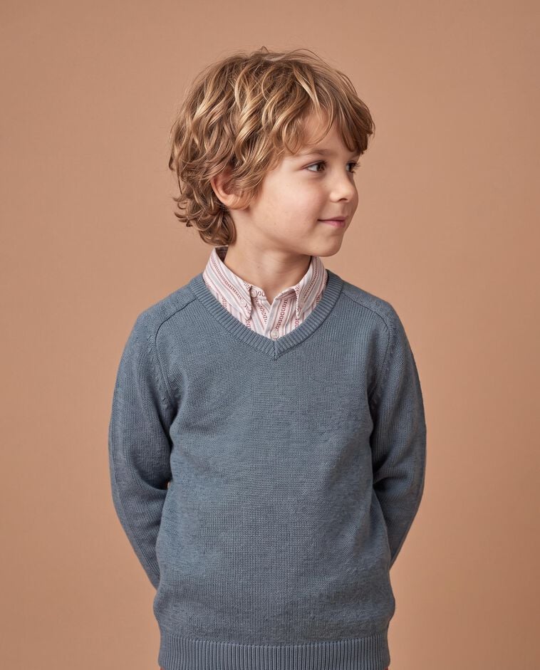 Maglione verde con scollo a V bambino