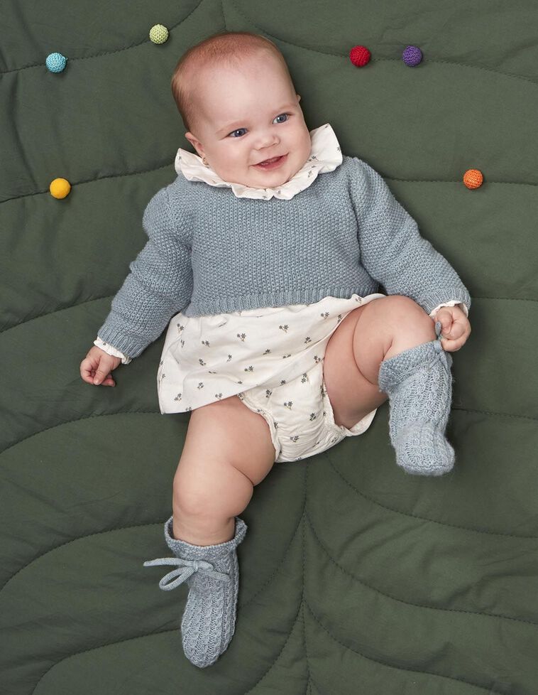 Veste en maille riz avec laine bleue Veste en maille riz avec laine bleue
