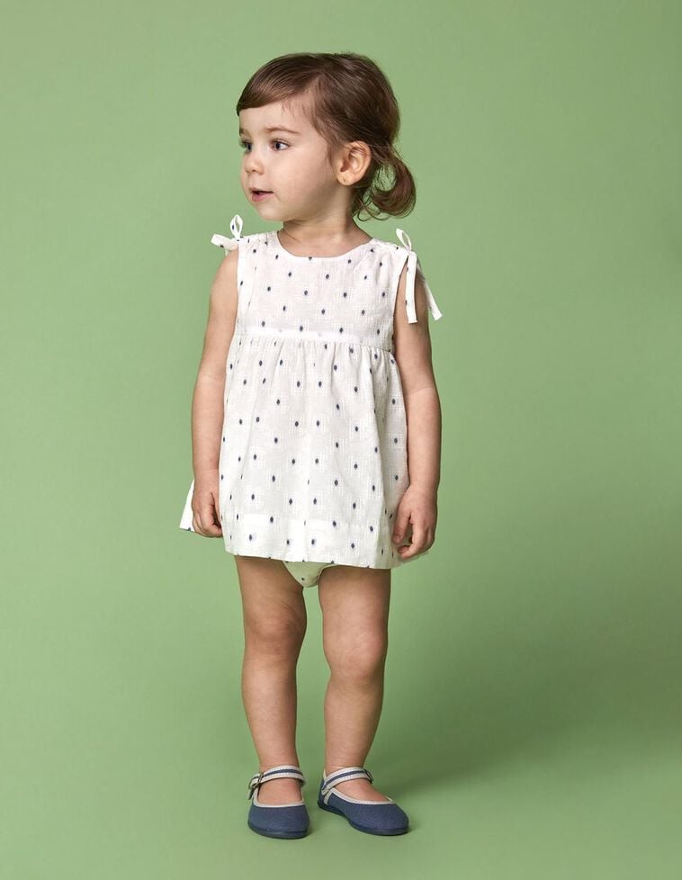 Robe dobby blanche à nœud sur les épaules