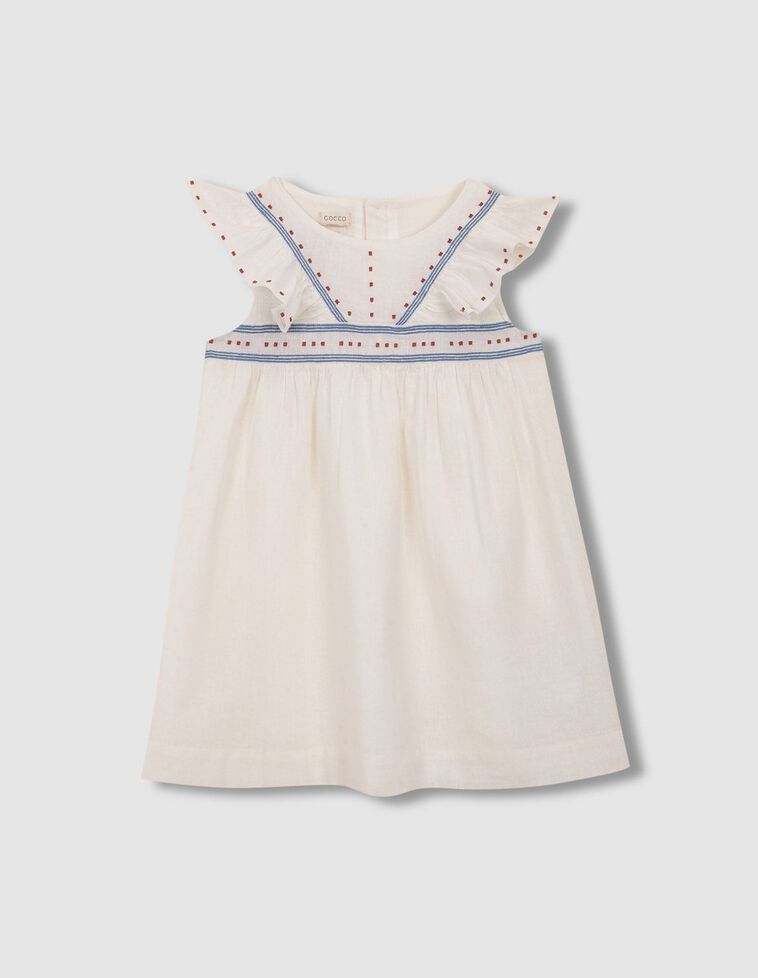 Robe avec broderies contrastées blanches