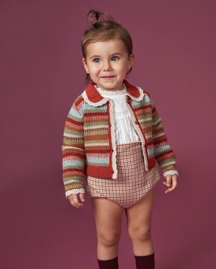 Giacca arancione con motivi jacquard e coste 
