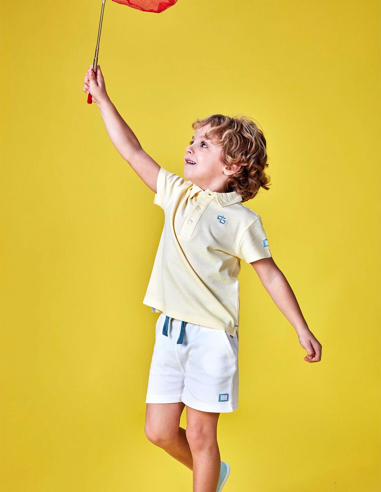 Polo in piqué color giallo  
