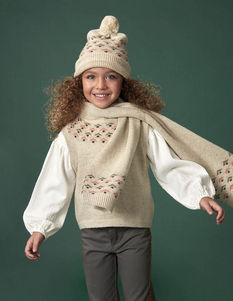 Bonnet avec intarsia et pompon couleur pierre