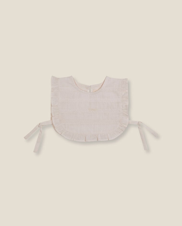 Bavoir blanc nouveau-n&eacute;