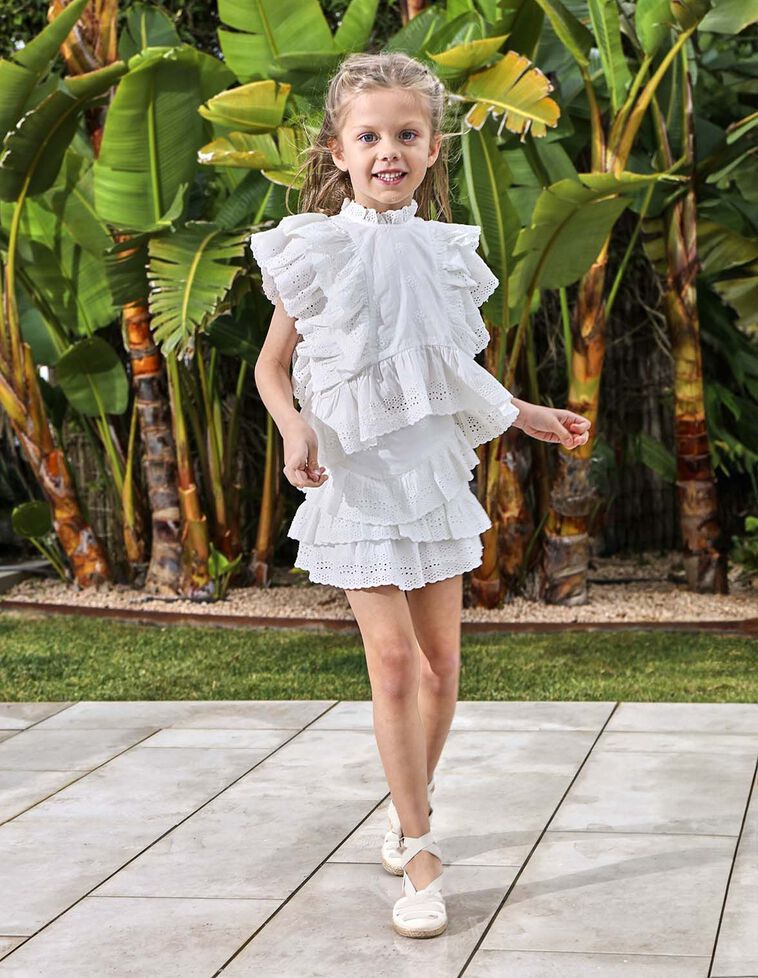 Blouse ajourée à volants blancs