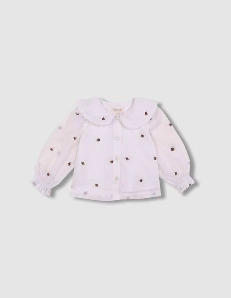 Blouse à fleurs blanches