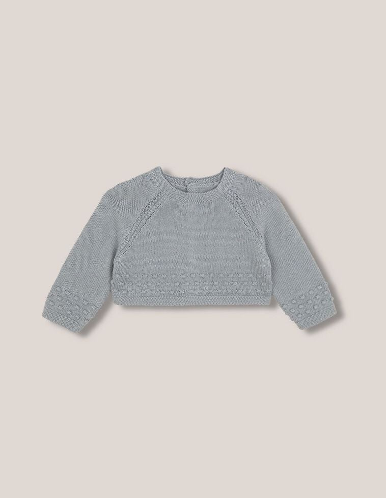 Pull avec laine et détails en maille bobo et pompons verts