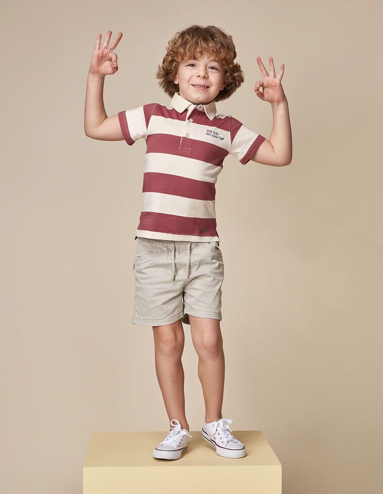 Polo con stampa golf rosa