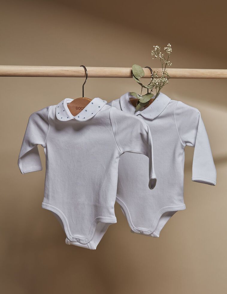 body cuello pique con bodoques