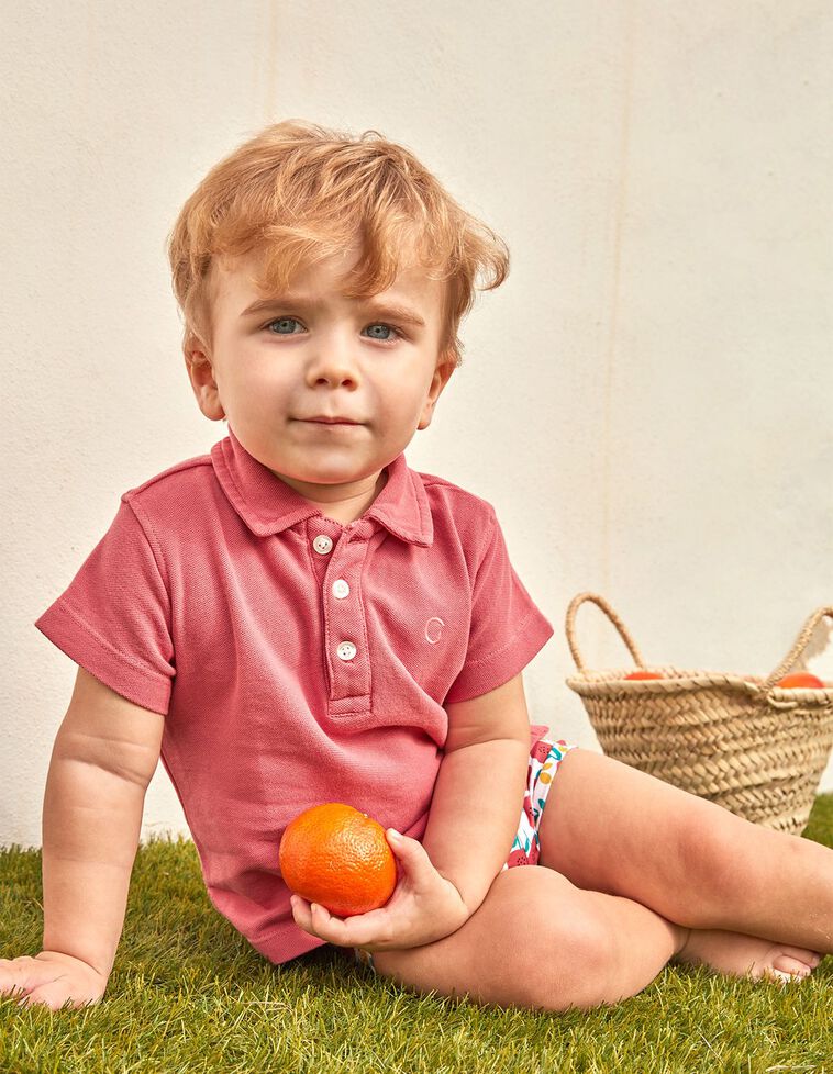 Polo in piqué color corallo 