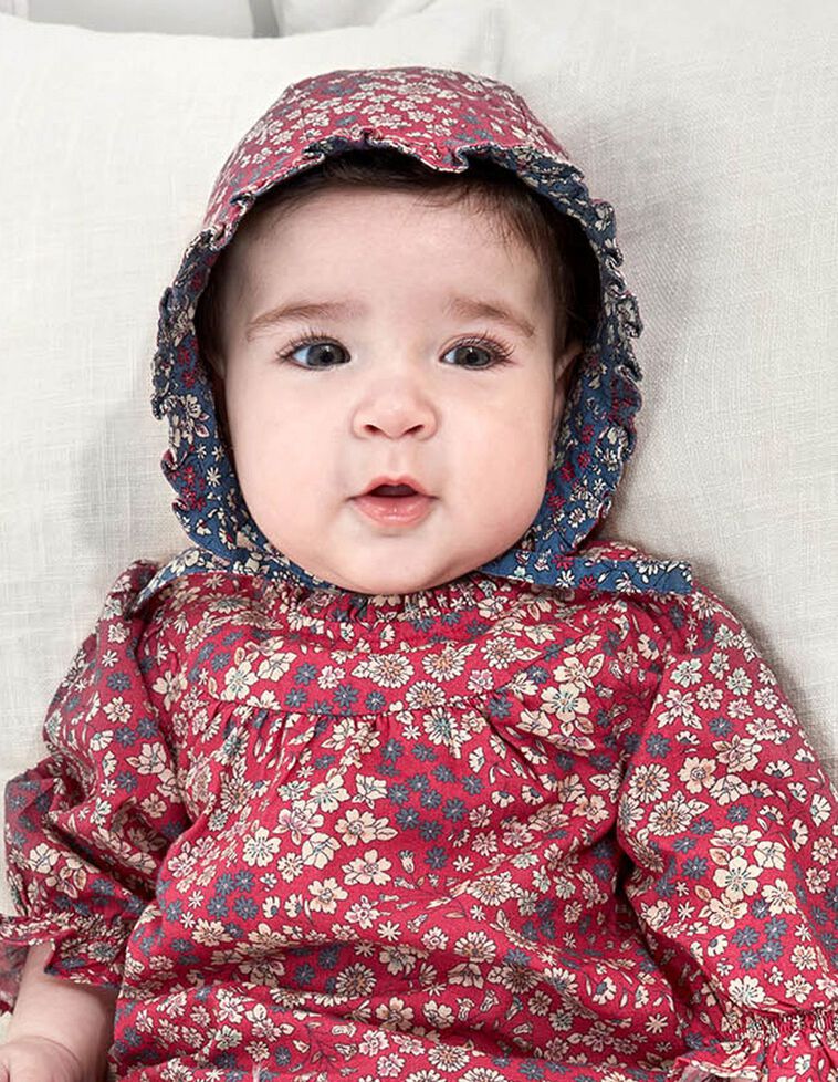 Bonnet type capuche imprimé rose