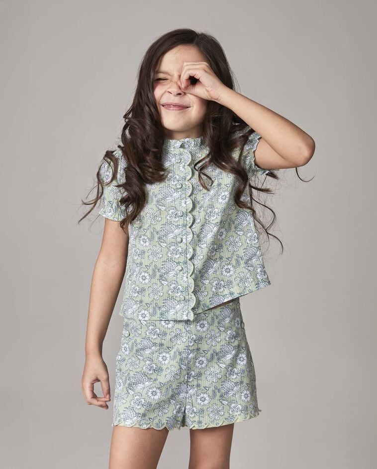 Pantaloni corti con bordo ondulato verdi