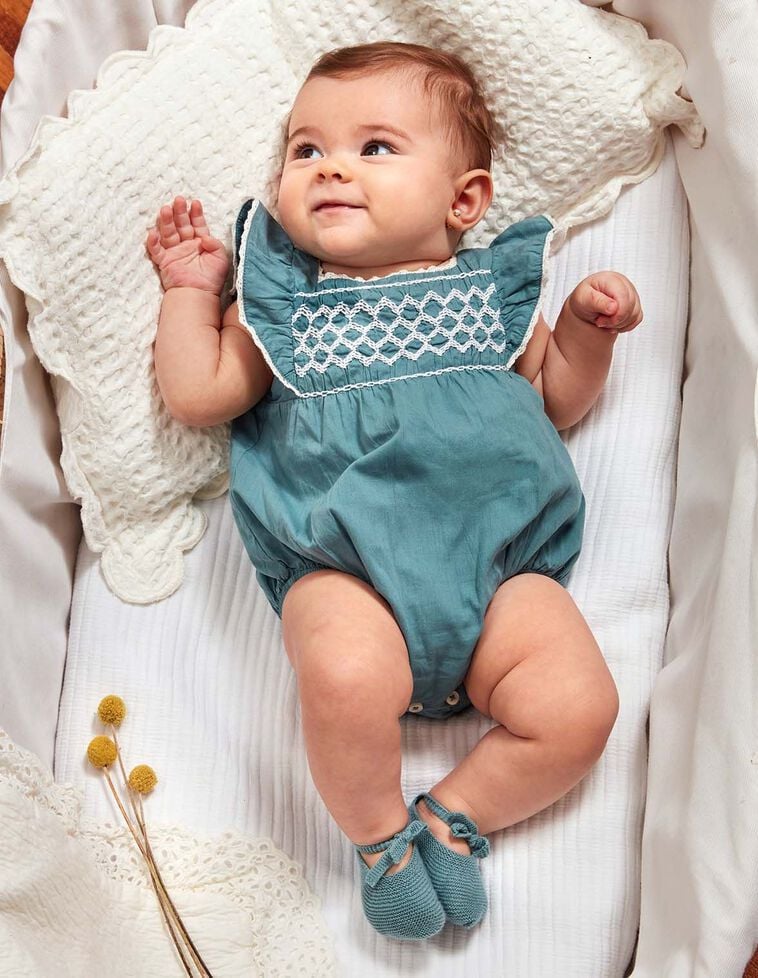 Pagliaccetto con smock azzurro