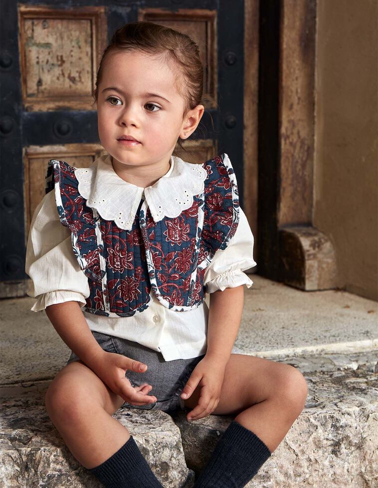 Gilet imbottito con volant verde petrolio