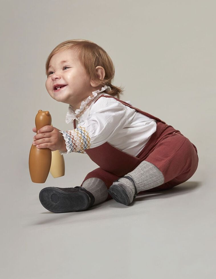 Blouse écrue avec smocks