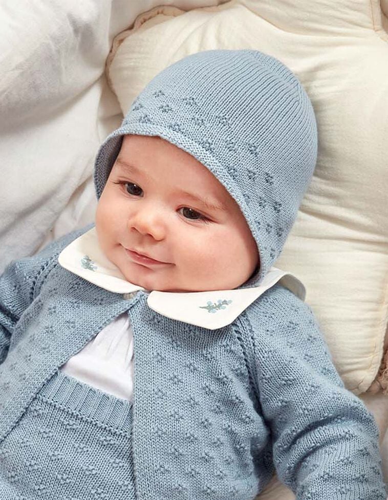 Cuffietta traforata in maglia azzurro