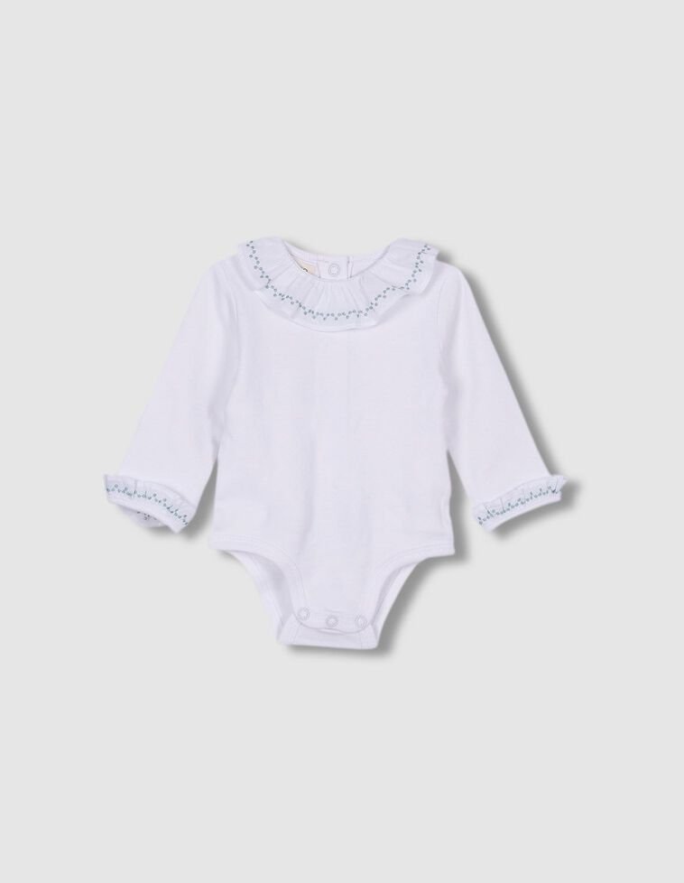 Body a maniche lunghe color bianco.