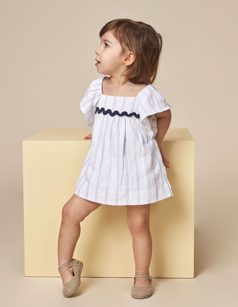Robe rayée détail vague blanche